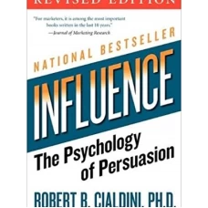 Cover of 'Influence: The Psychology of Persuasion' by Robert B. Cialdini, featuring a bold design and key insights on persuasion techniques.